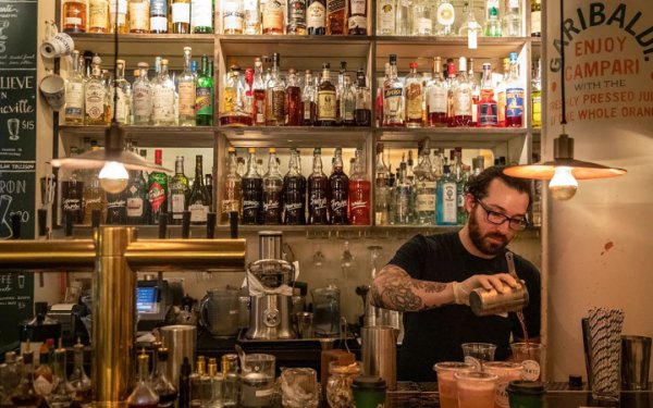 Bartender mixing drinks