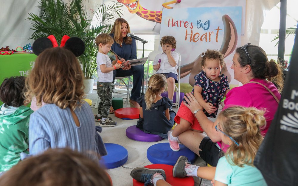 Reading activity at Children's Alley