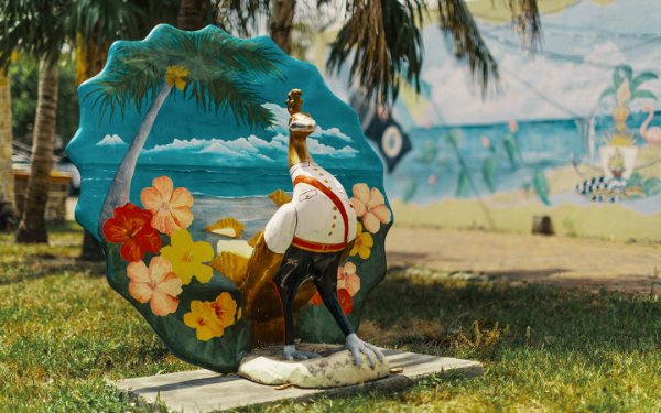 Nassau Daddy peacock sculpture