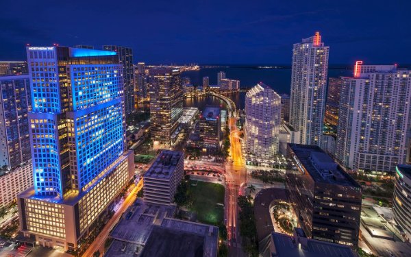 Glowing skyline on Brickell Avenue and Brickell Key at night