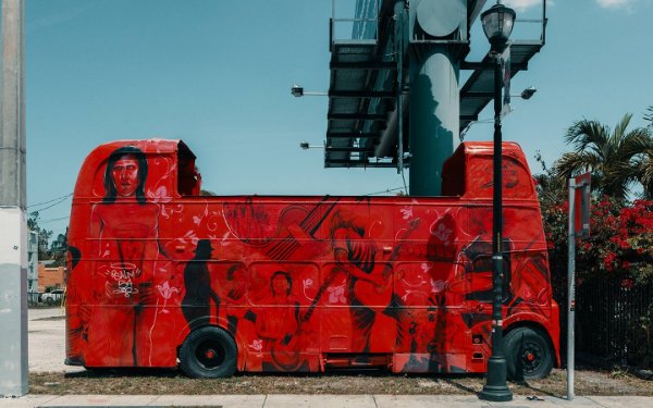 Red bus in front of Churchill's Pub