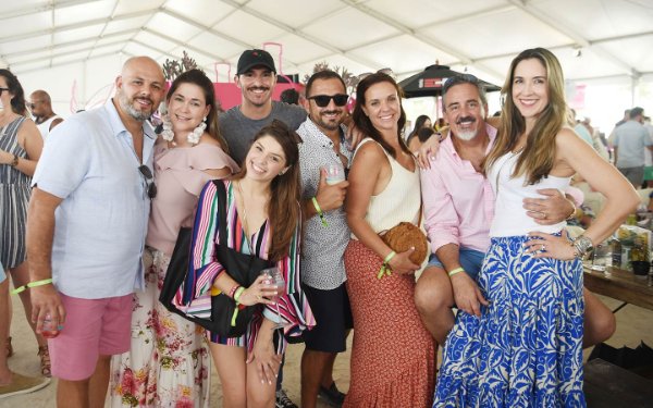 Friends posing for a picture at SOBEWFF