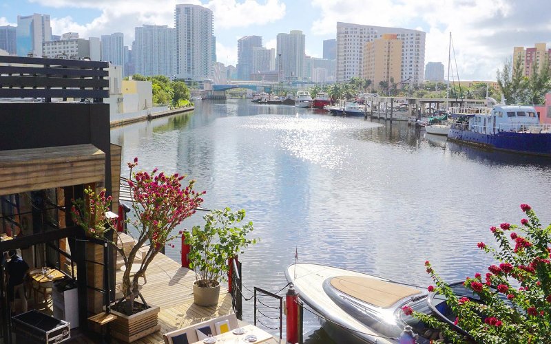 Scenic view of boats floating by the waterfront at Seaspice